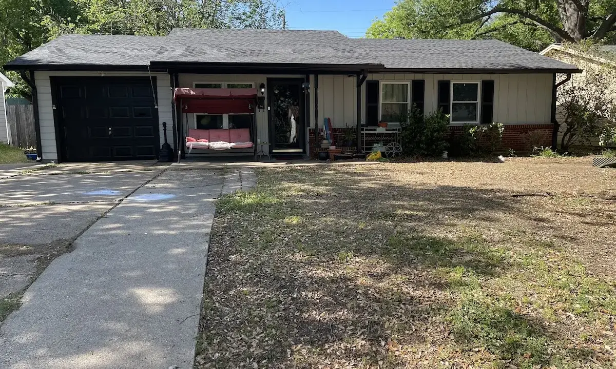 Wind Damage Roof Repair crew at work on a residential roof in Roanoke Rapids